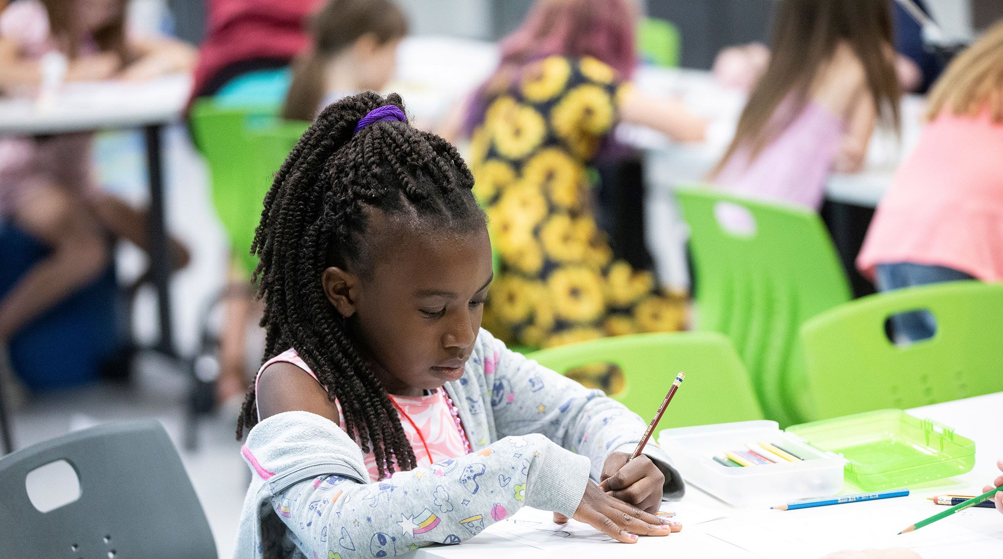 Girl working in science center